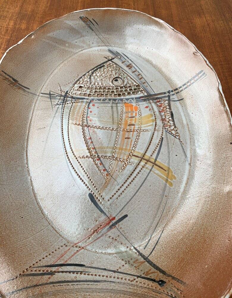 Large German ceramic plate with fish from the mid-century.