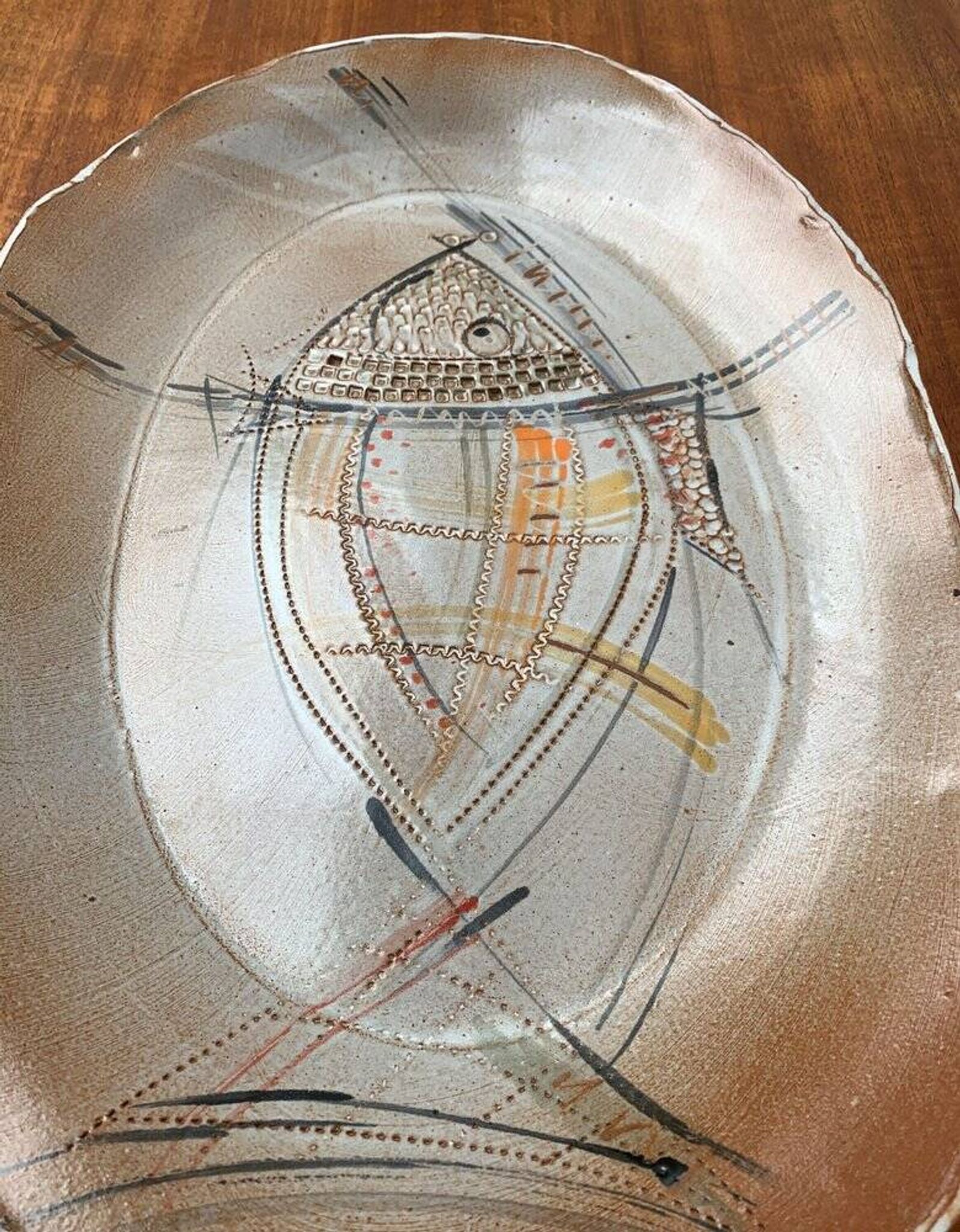 Large German ceramic plate with fish from the mid-century.