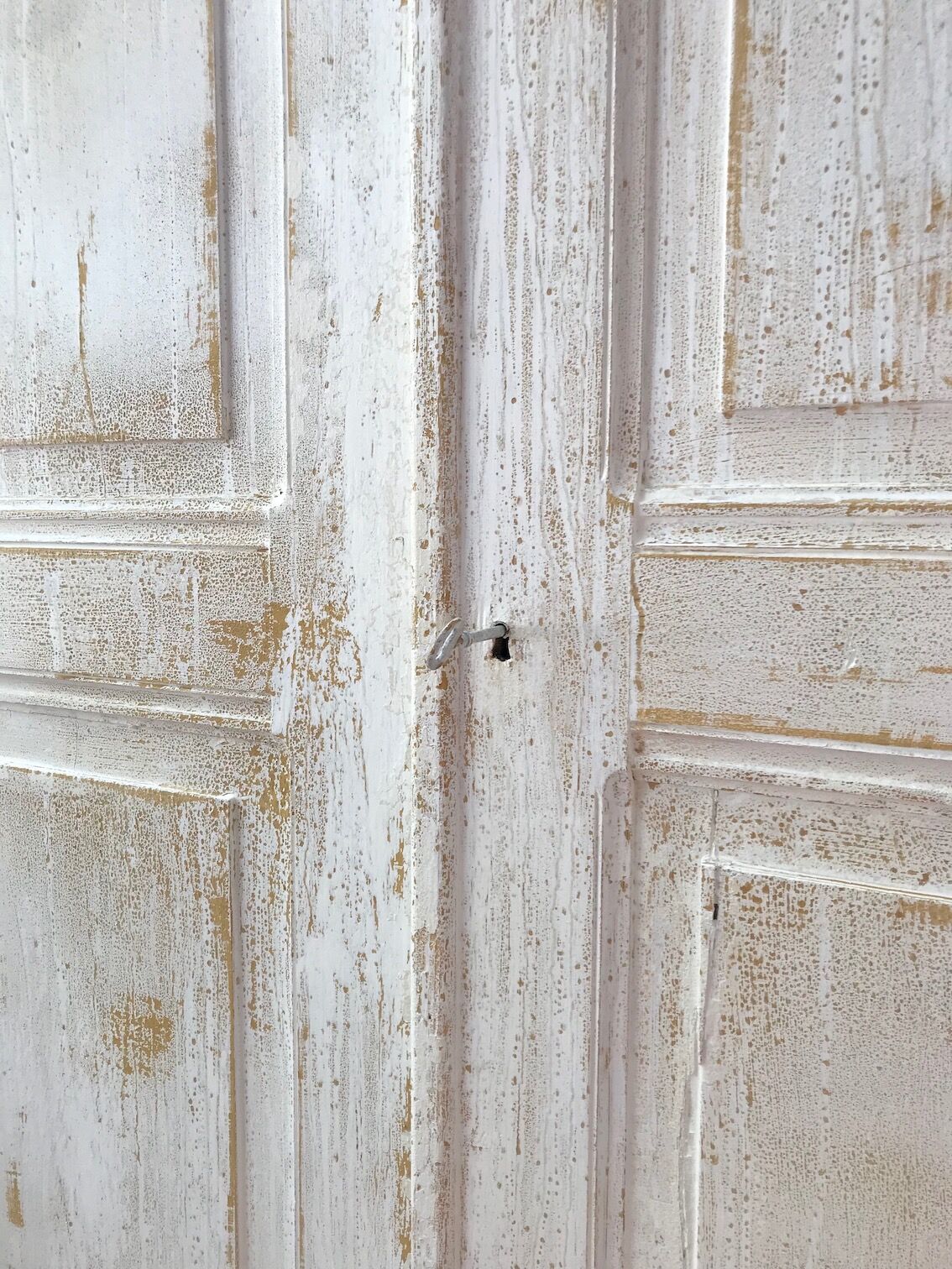Antique wardrobe in patinated pine
