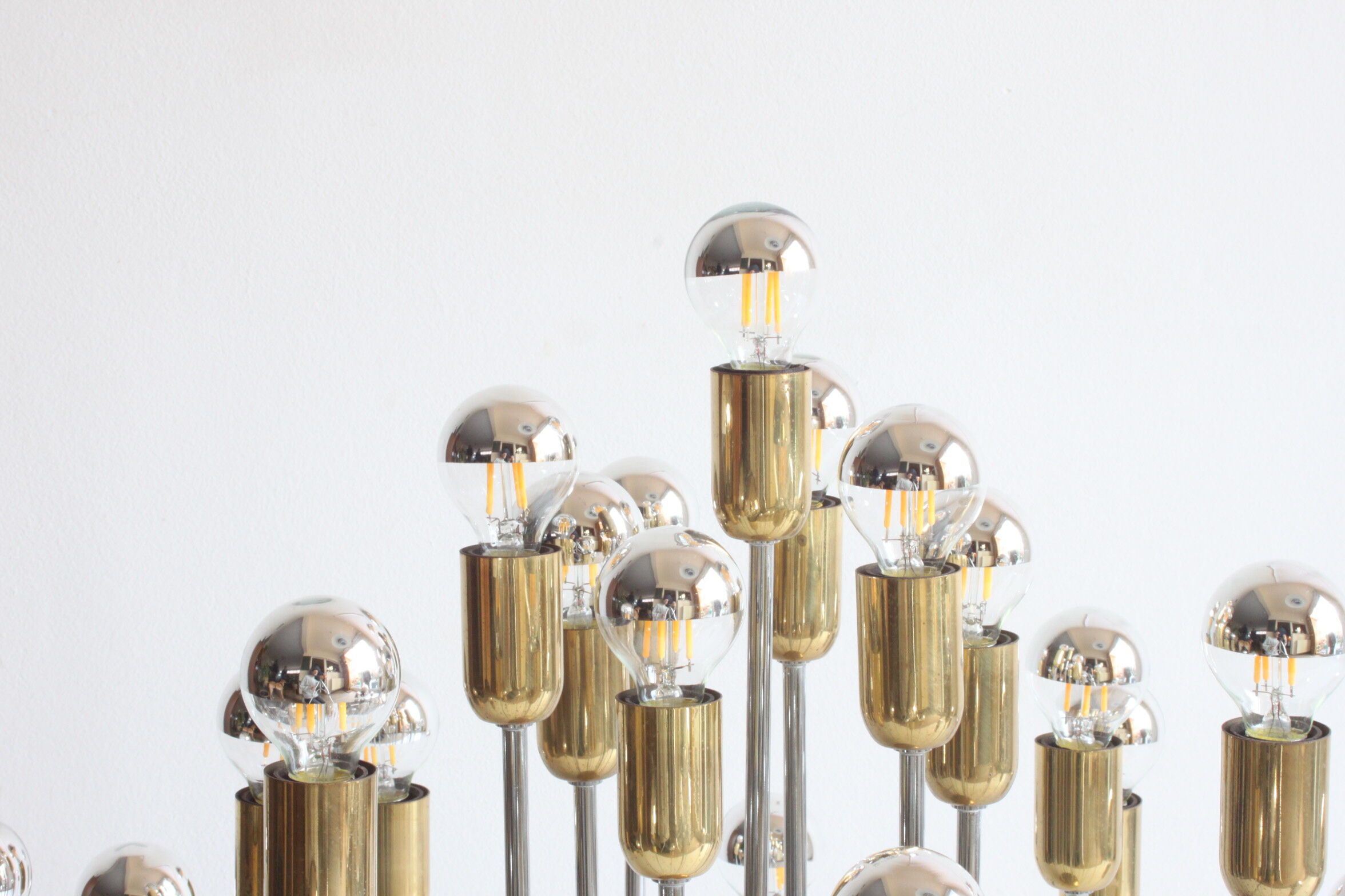 Tubular chrome and brass waterfall chandelier, Italy 1970s.