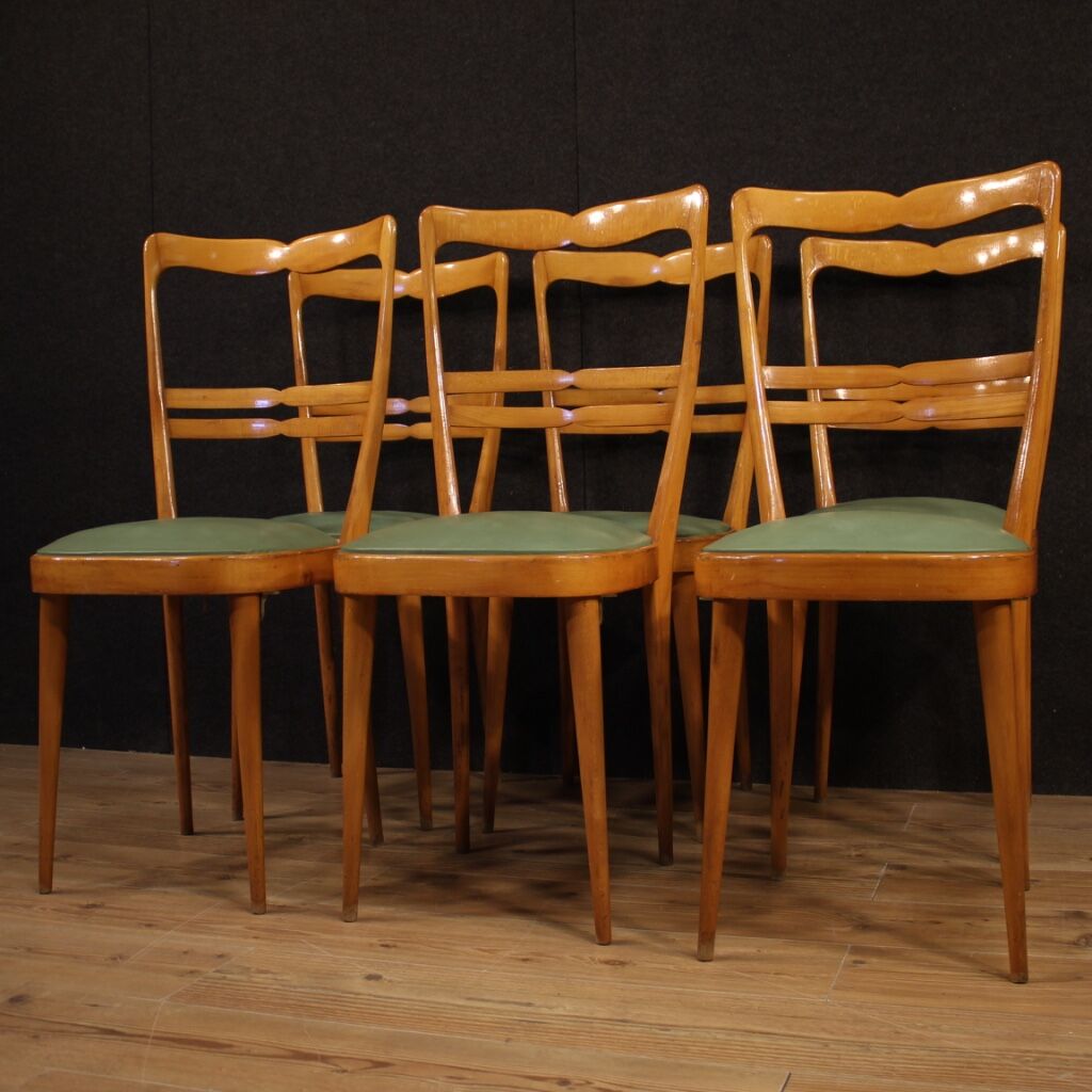 Six Italian  chairs in exotic wood and faux leather
