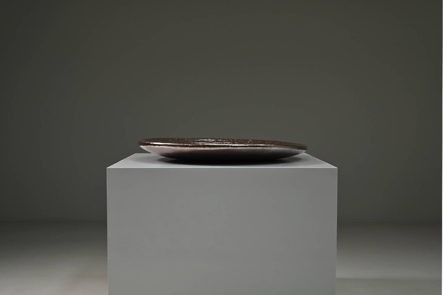Large handmade metallic glazed ceramic bowl, circa 1980s–1990s.