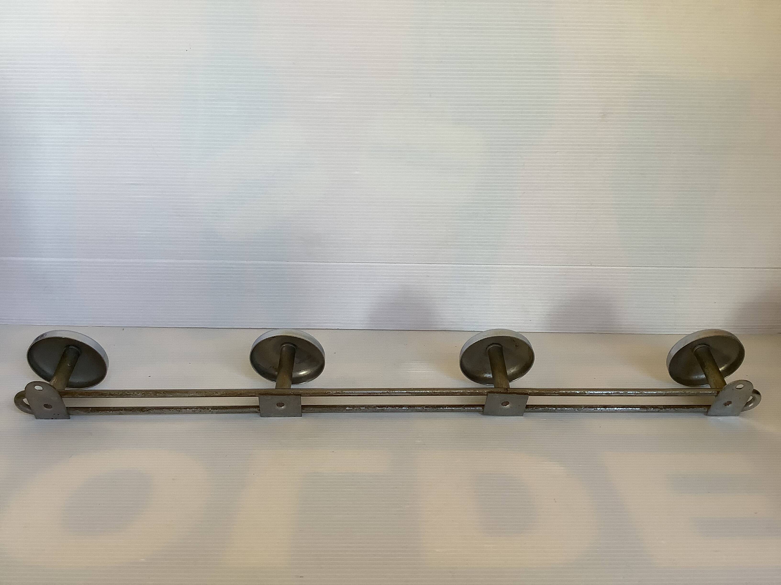 Chromed metal coat rack with four hooks