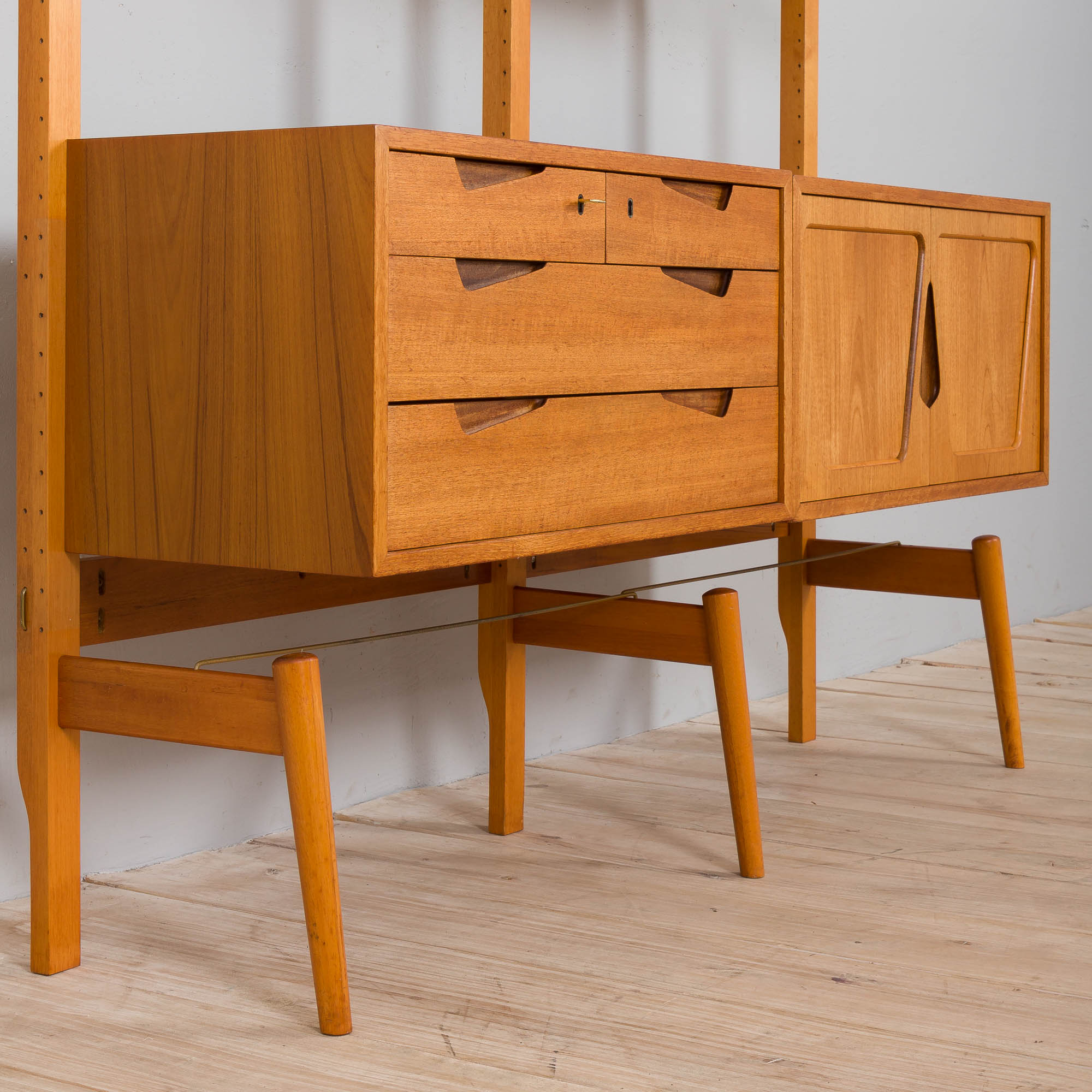 Rival 2 bay teak wall unit with 3 cabinets and 5 shelves by Brodrene Jatogs Norway, Kjell Riise, 196