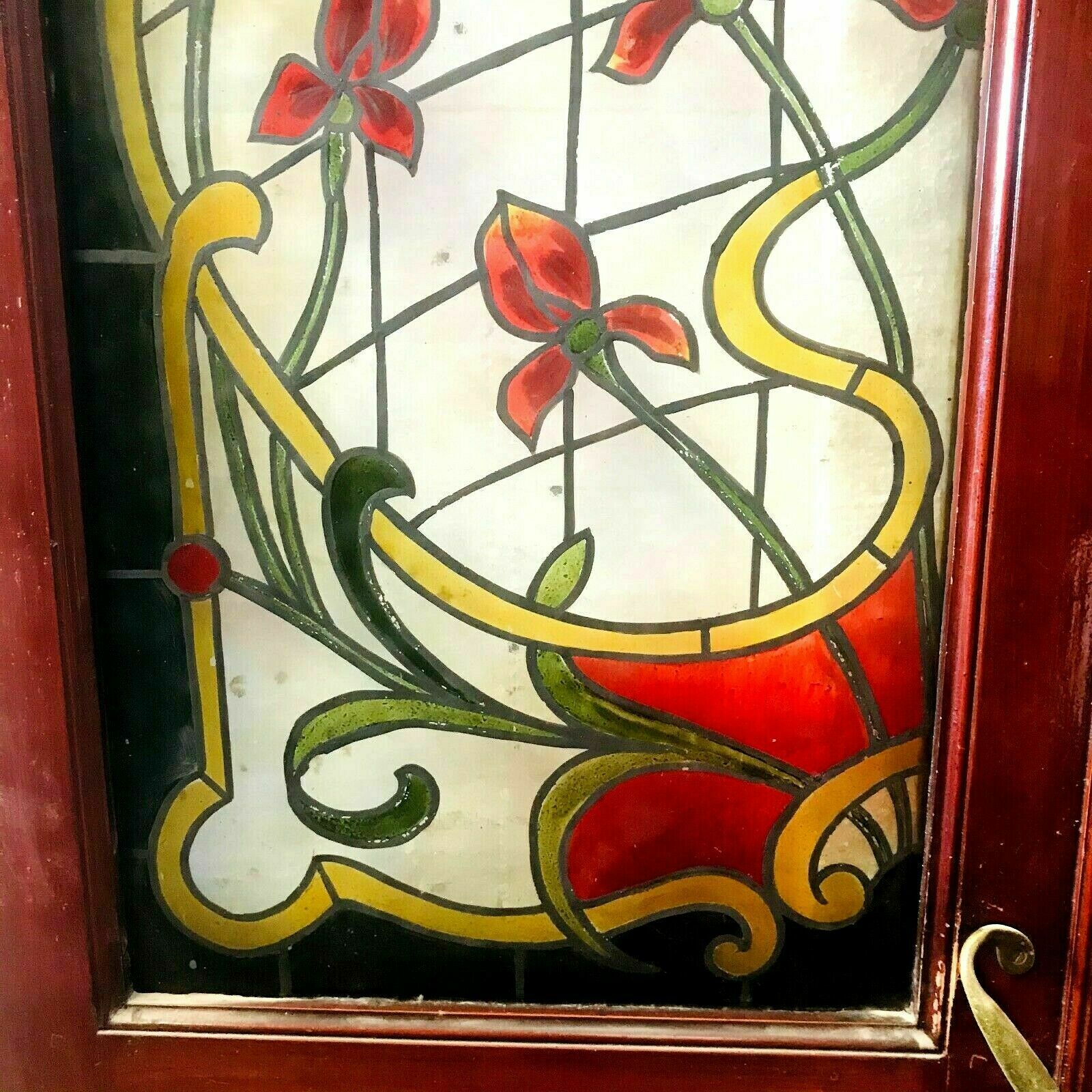 Pair of art deco doors in glass painted in imitation of 20th century stained glass