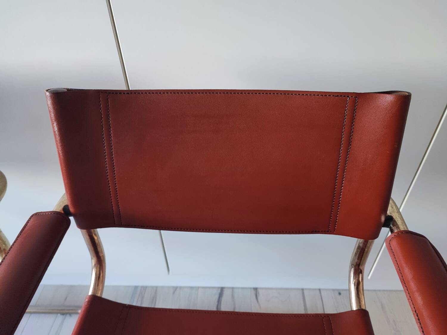 B34 armchairs, cognac leather and gilding