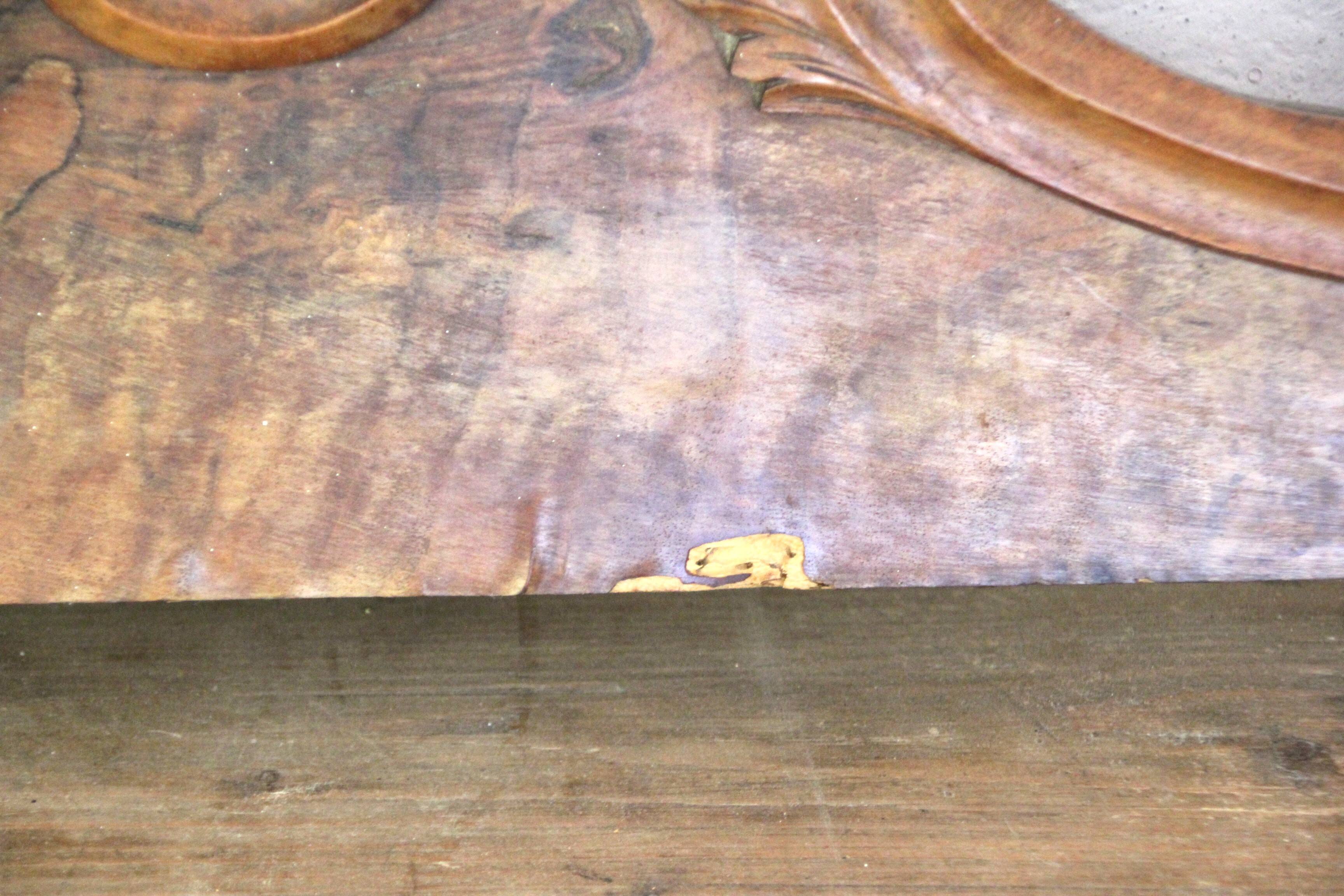 Old pediment in solid and marquetry wood