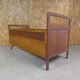 Vintage rattan and wood bed for children's compass feet