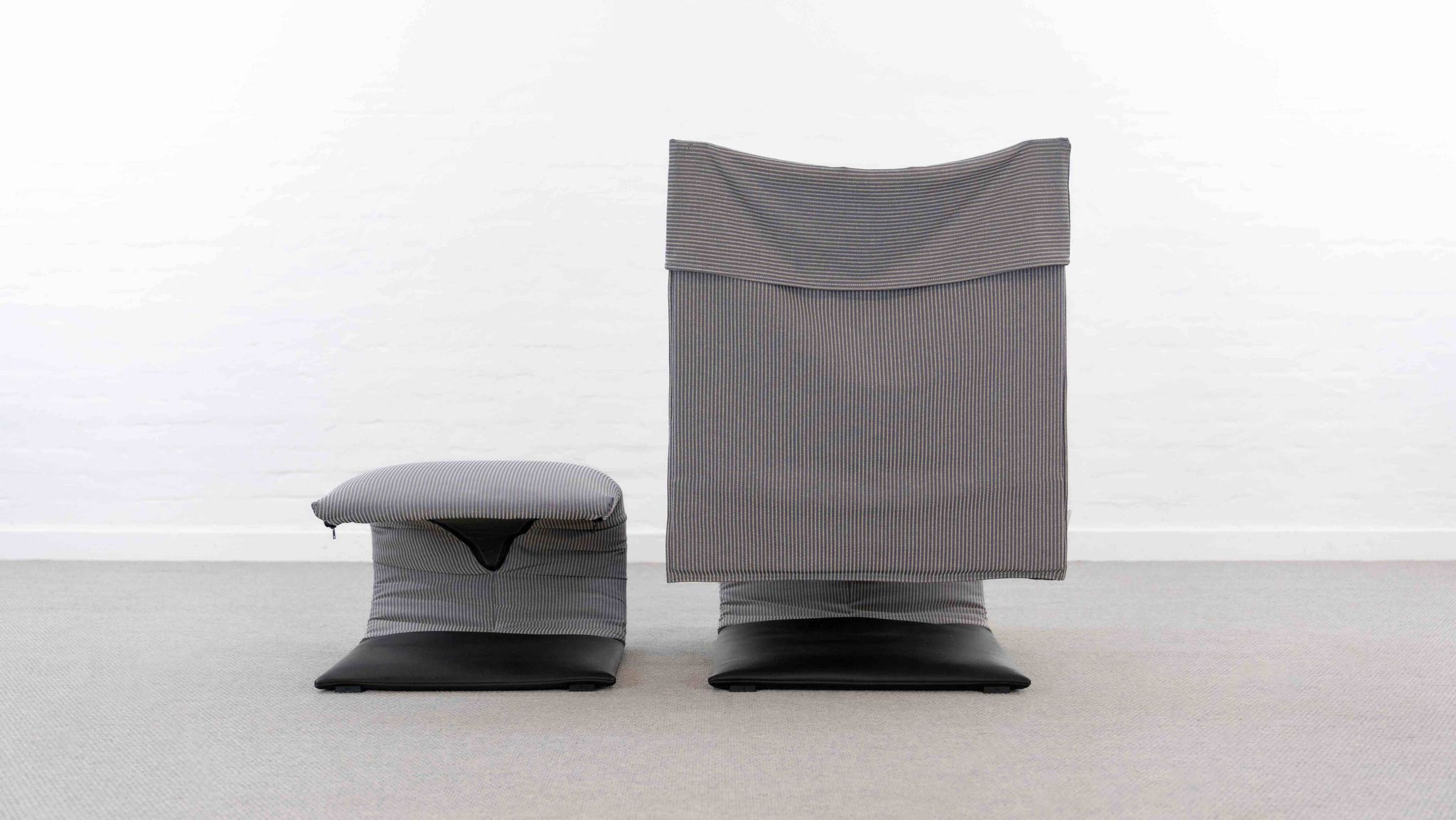 Fauteuil zen avec repose-pieds par claude brisson pour ligne roset