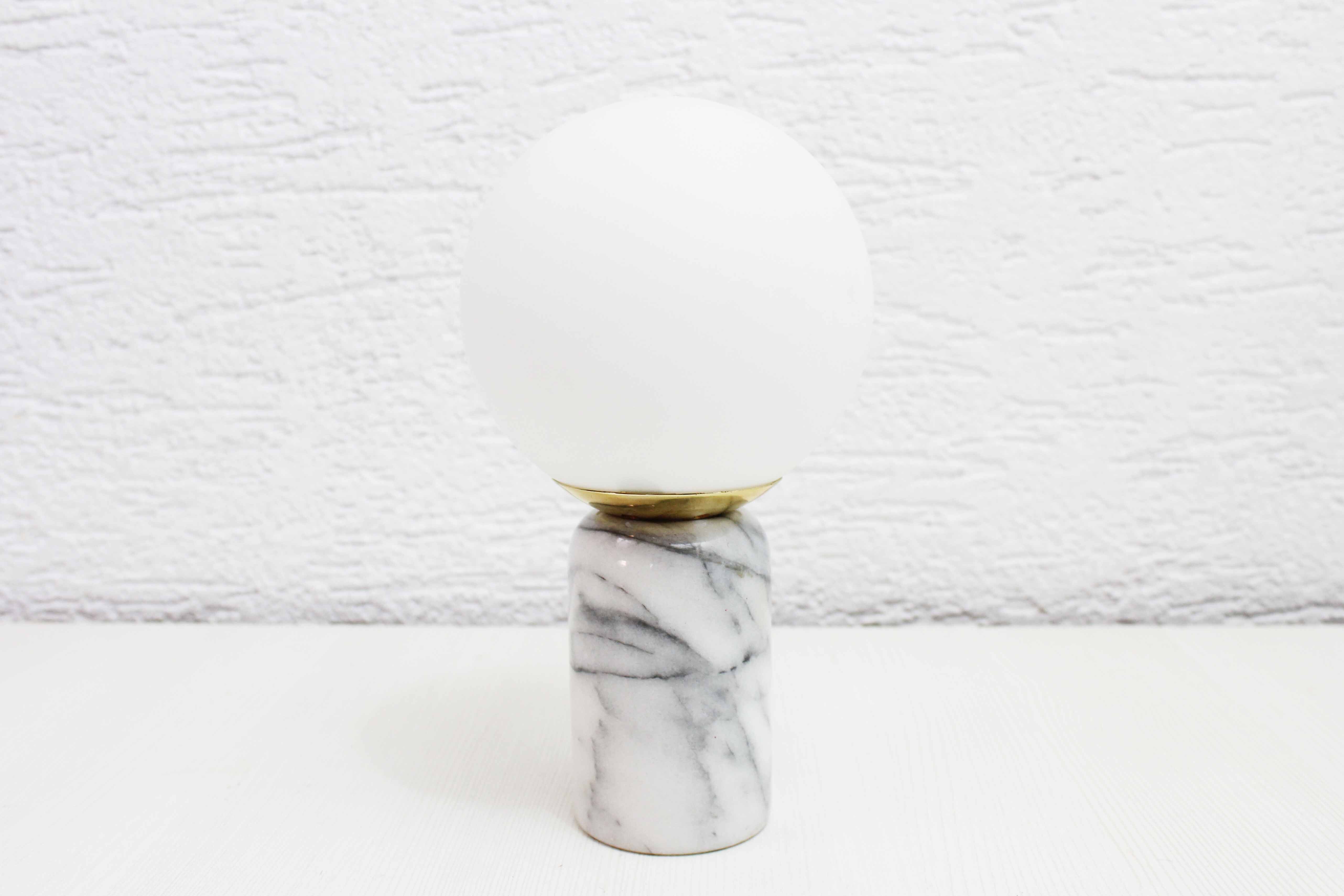 Table lamp in white marble and glass