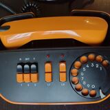 Vintage orange telic phone with ptt dial