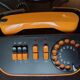 Vintage orange telic phone with ptt dial
