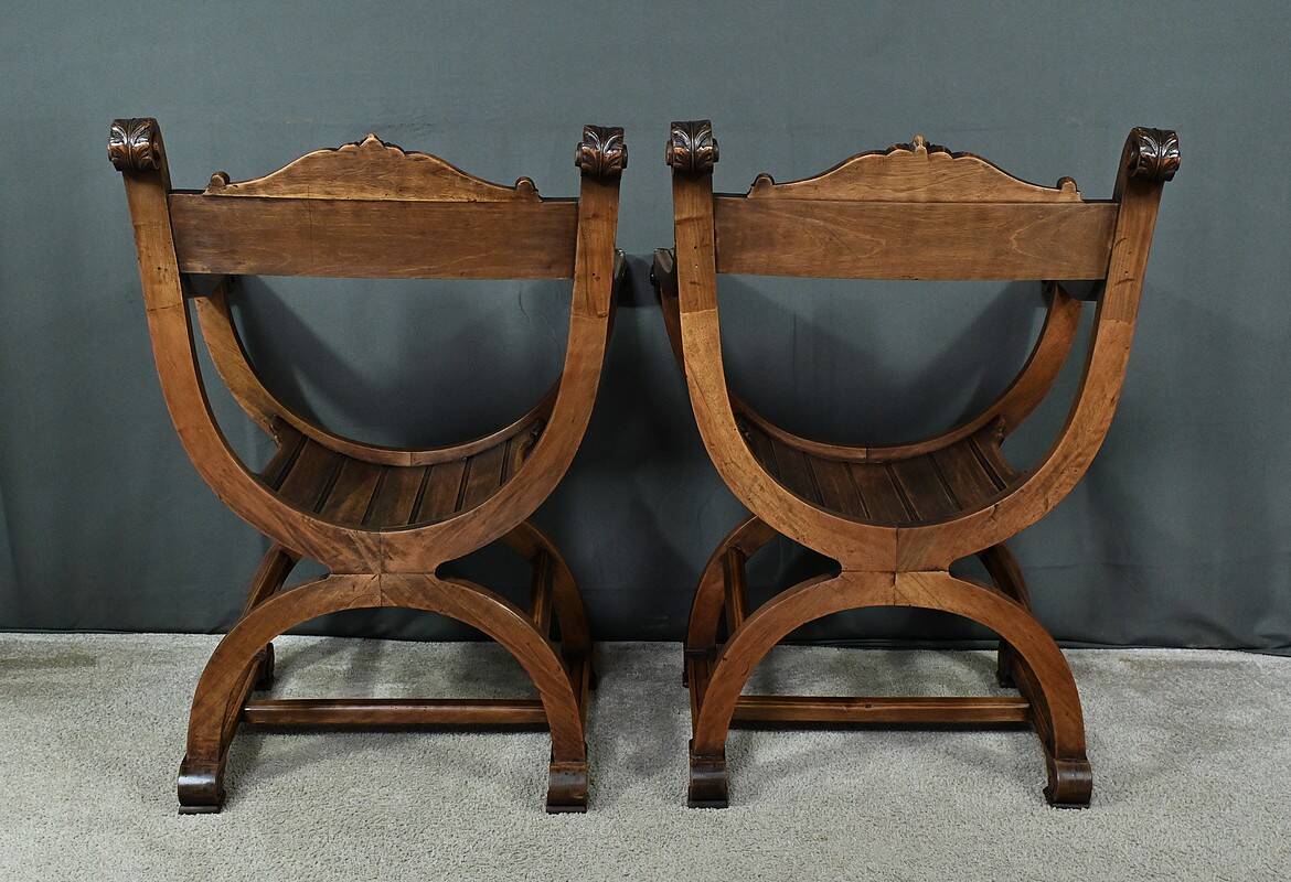 Pair of Dagobert walnut armchairs, medieval style – late 19th century