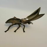 Old brass ashtray in the shape of a fly
