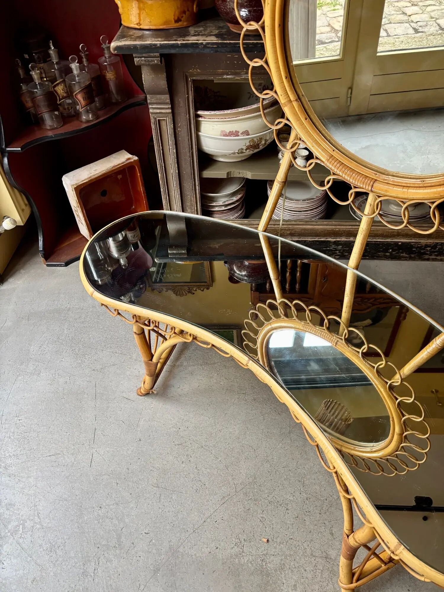 Bamboo, rattan and mirror dressing table with lighting in the style of Audoux-Minet, 1960s.