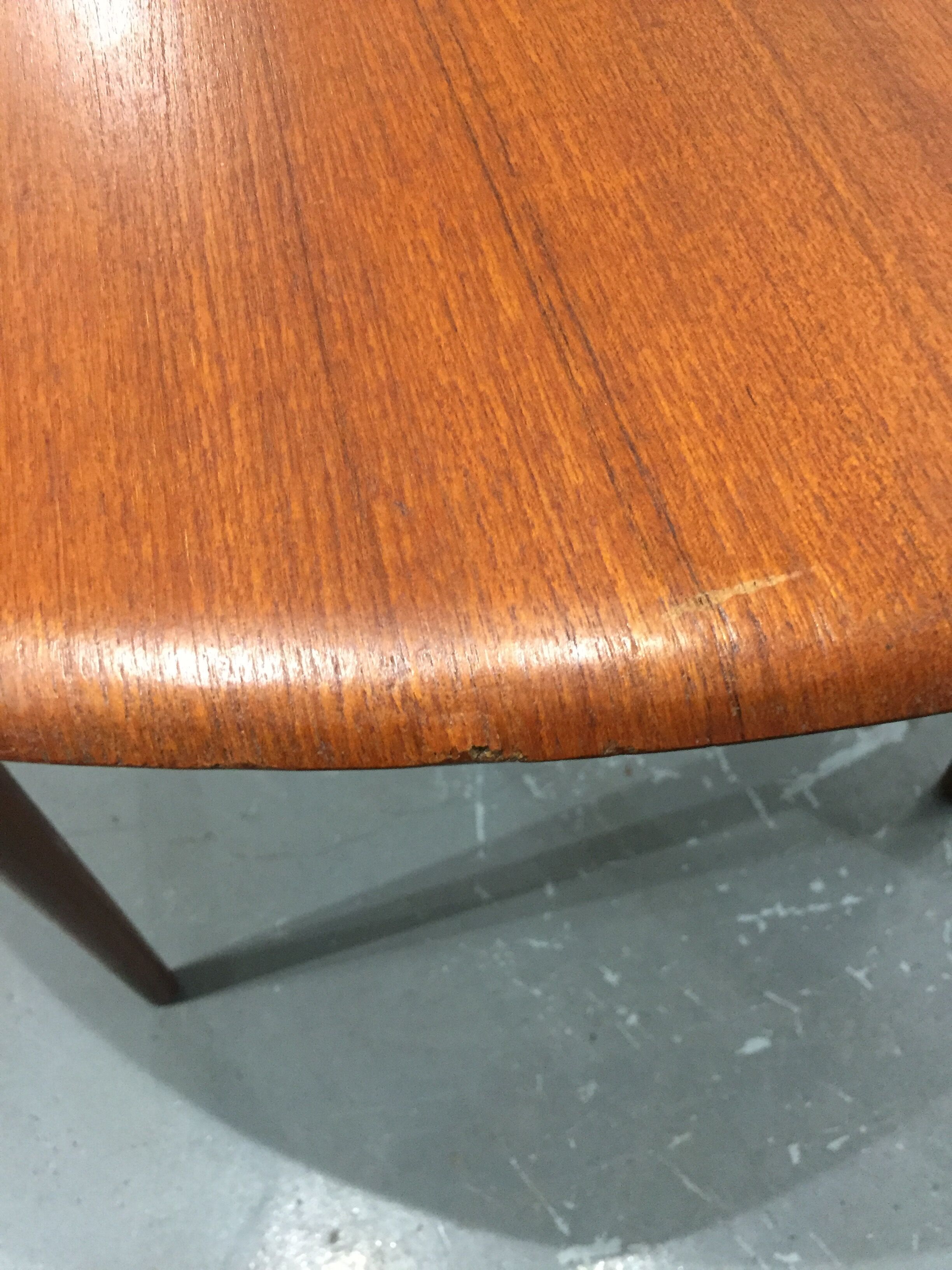 Round scandinavian teak table