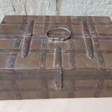 Old tribal chest in hammered metal