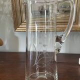 Blown crystal pitcher or carafe with floral motif and engraving