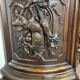 Buffet deux corps de chasse de style Henri II en chêne sculpté vitré