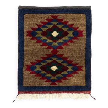 Tapis Tulu turc vintage fait à la main avec un design de médaillon géométrique en marron, bleu marine et rouge. 100 % laine.