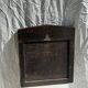 Small antique English rectangular mirror with pediment and oak frame