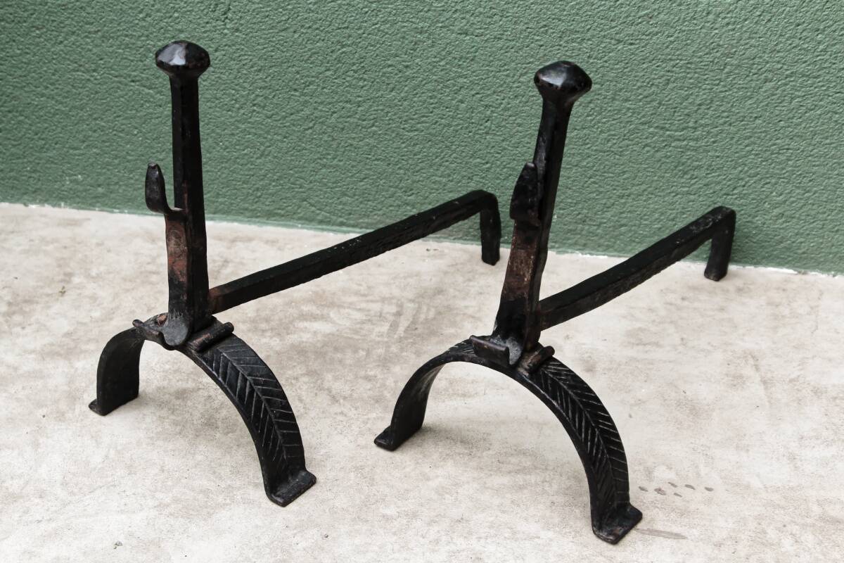 Pair of wrought iron andirons; 17th century