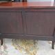 Empire style chest of drawers with gooseneck