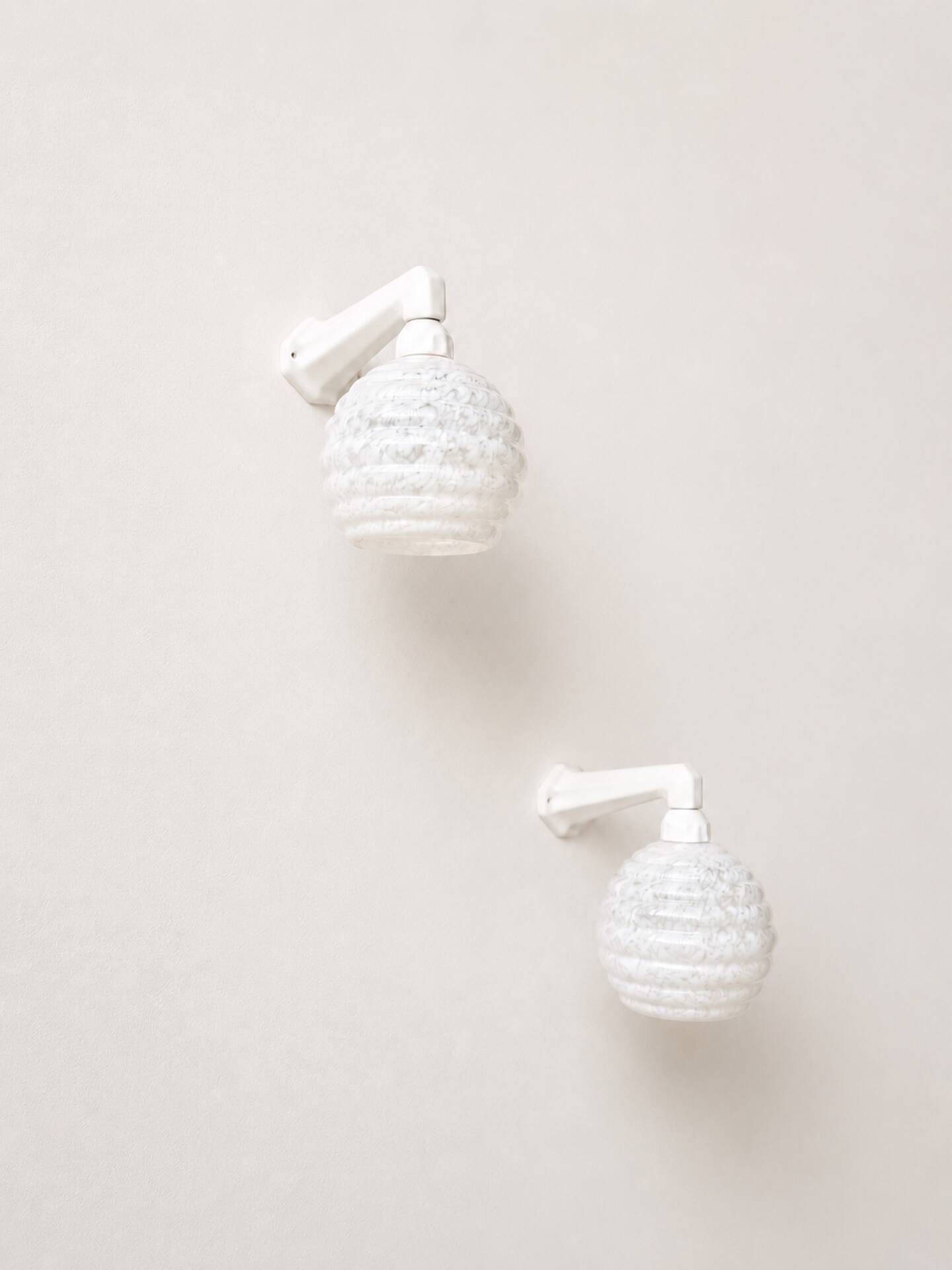 Pair of Art Deco wall lights in porcelain