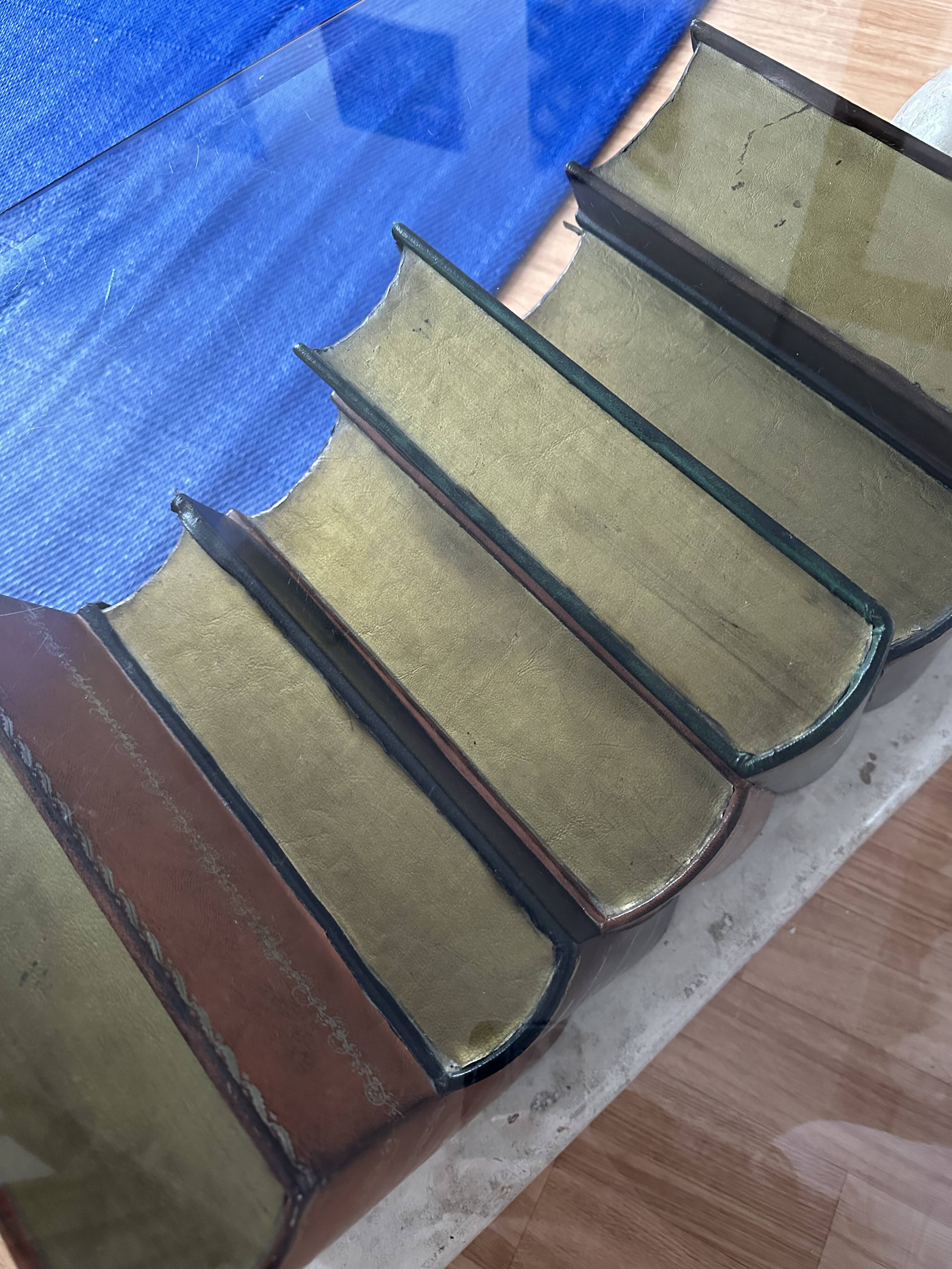 Vintage glass coffee table with trompe-l'oeil book base