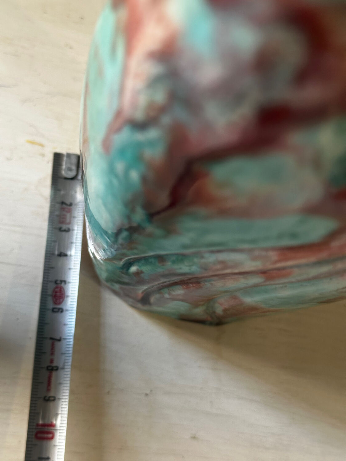 Vintage pair of turquoise and red ceramic candlesticks