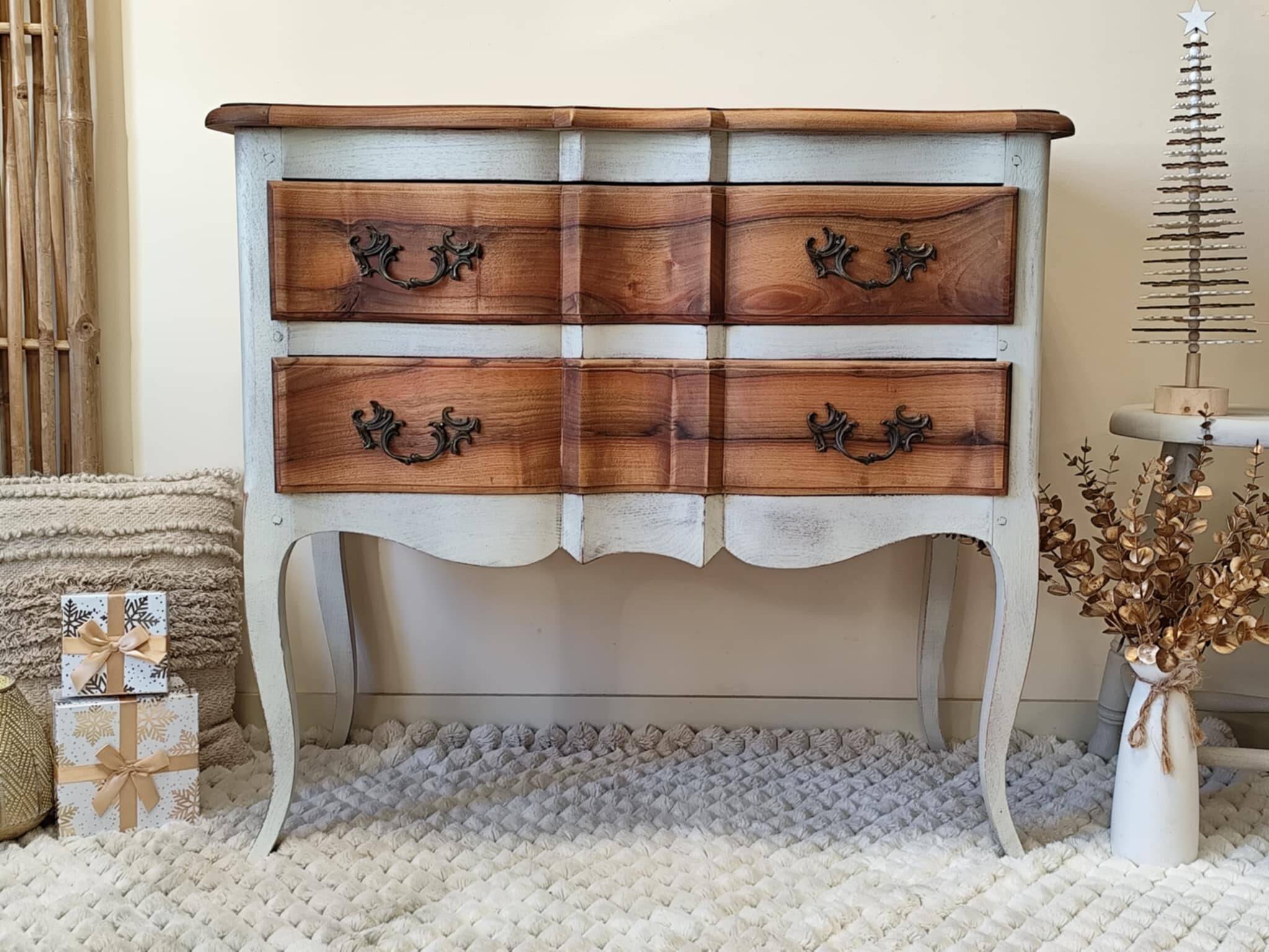 Walnut crossbow chest of drawers