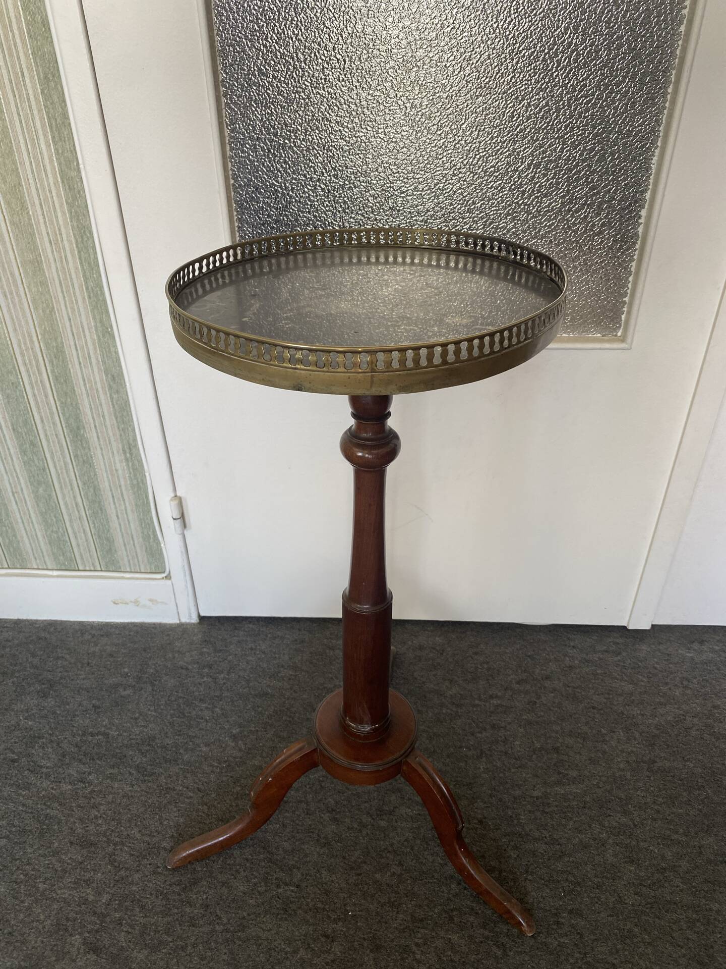 Elegant round wooden side table