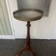 Elegant round wooden side table