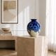 Large Tharaud Limoges vase in cobalt blue porcelain with floral decoration.