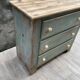 Commode en bois patinée