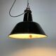 Industrial black enamel factory lamp with cast iron top, 1950s