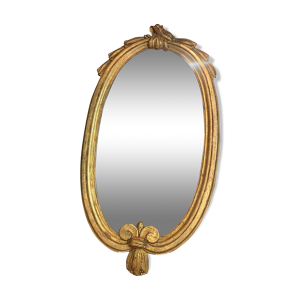 Miroir oval en bois doré