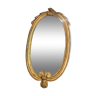 Miroir oval en bois doré
