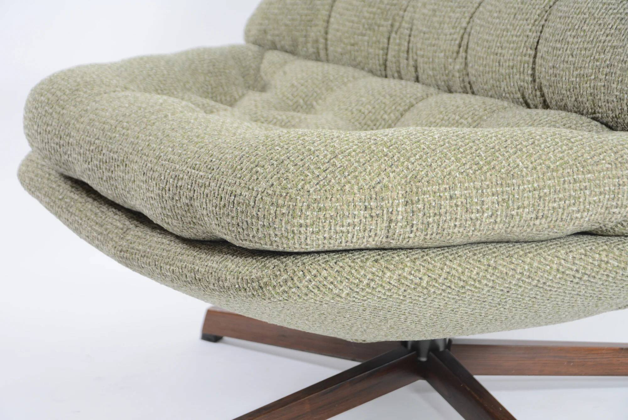 Green swivel Scandinavian armchair