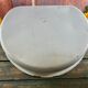 Old white enamelled hand washbasin or gardener enamel garden