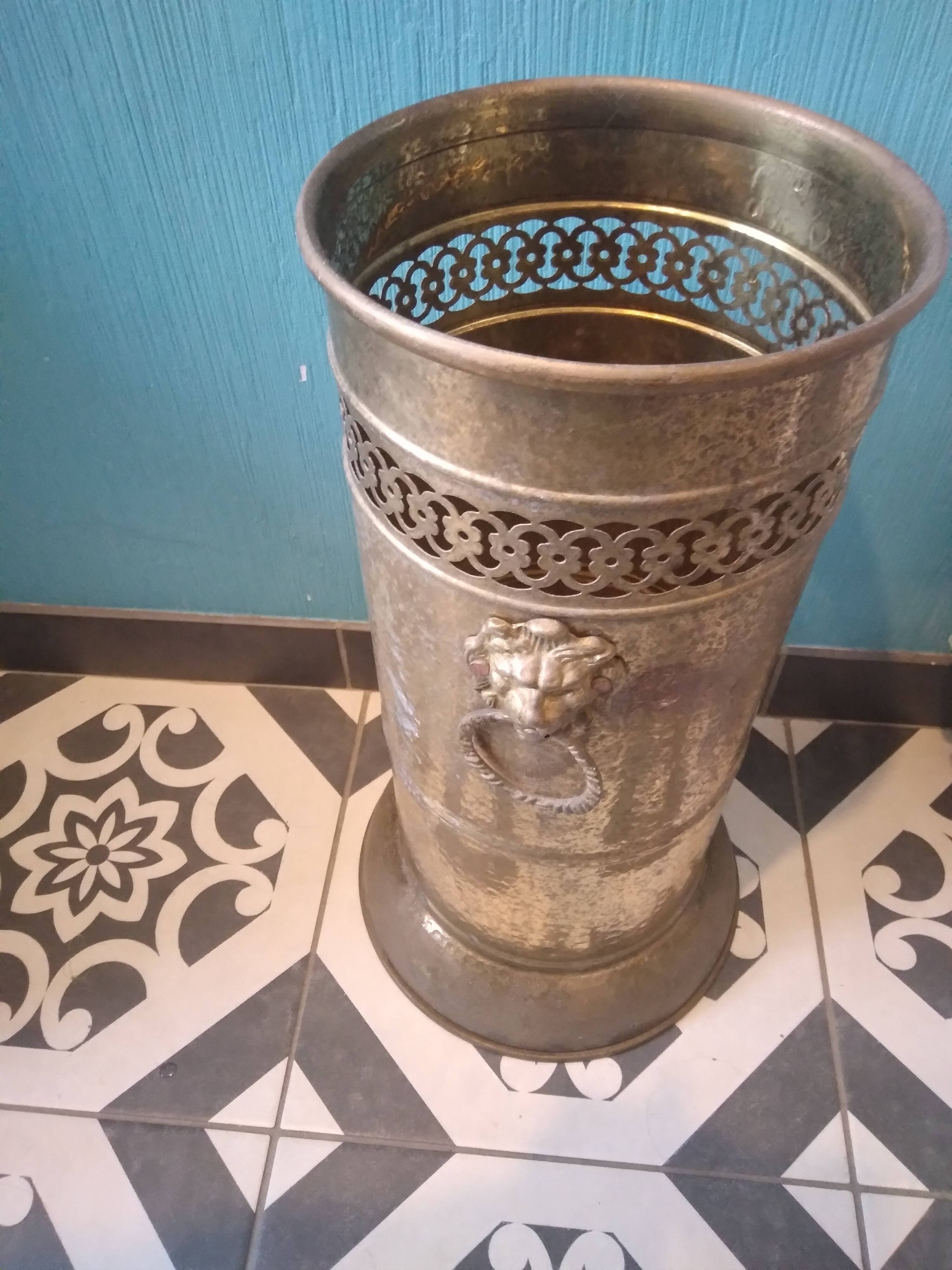 Brass umbrella stand with lion's head
