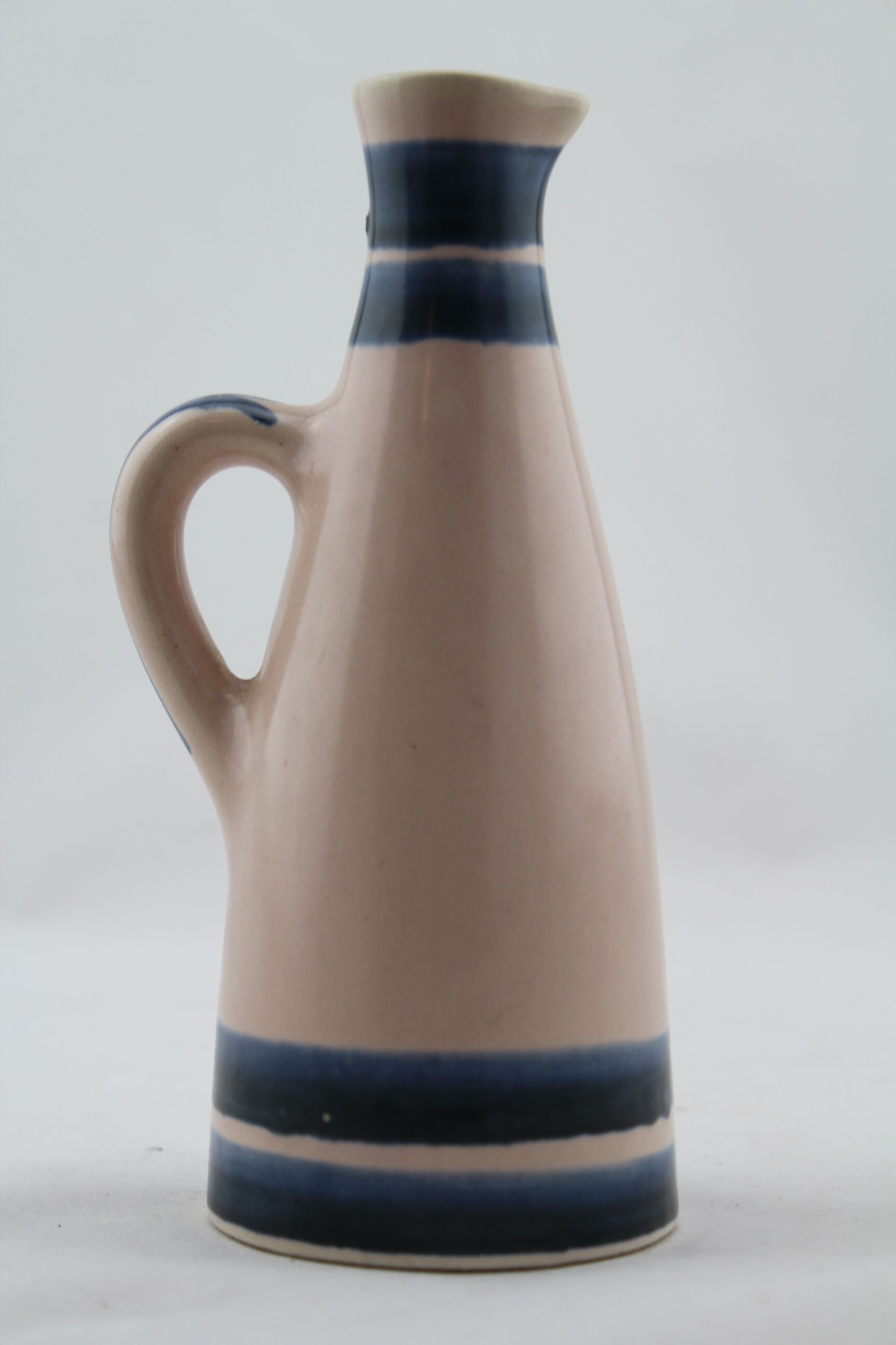 Pitcher ceramic white with blue flower, doilies