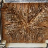 Patinated wooden stool with straw seat