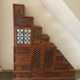 Indonesian staircase furniture in rosewood and wrought iron.