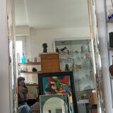 Large vintage Hollywood Regency style mirror with shutters.