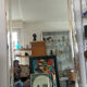 Large vintage Hollywood Regency style mirror with shutters.