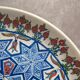 Large vintage wall plate in ceramic from Kütahya, signed – hand-painted oriental decoration.