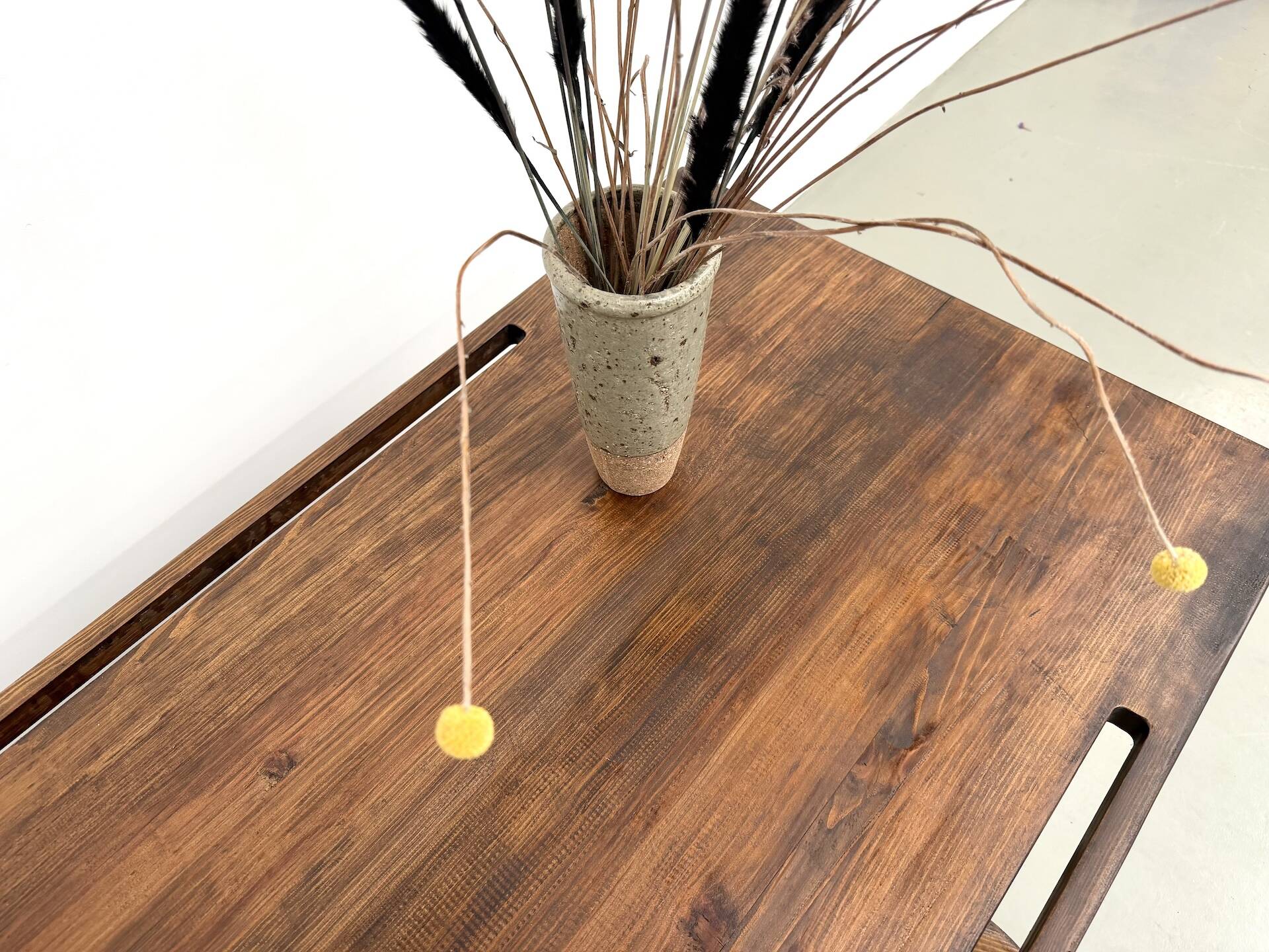 Solid pine workbench, grooved top, satin brown finish.