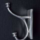 Pair of vintage cast aluminum coat hooks