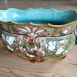 Large antique jardinère in barbotine with masks,